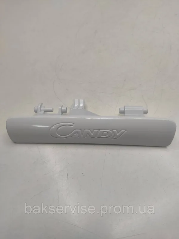 Ручка дверцят (люка) Candy 46000973 Нова, зображення 1